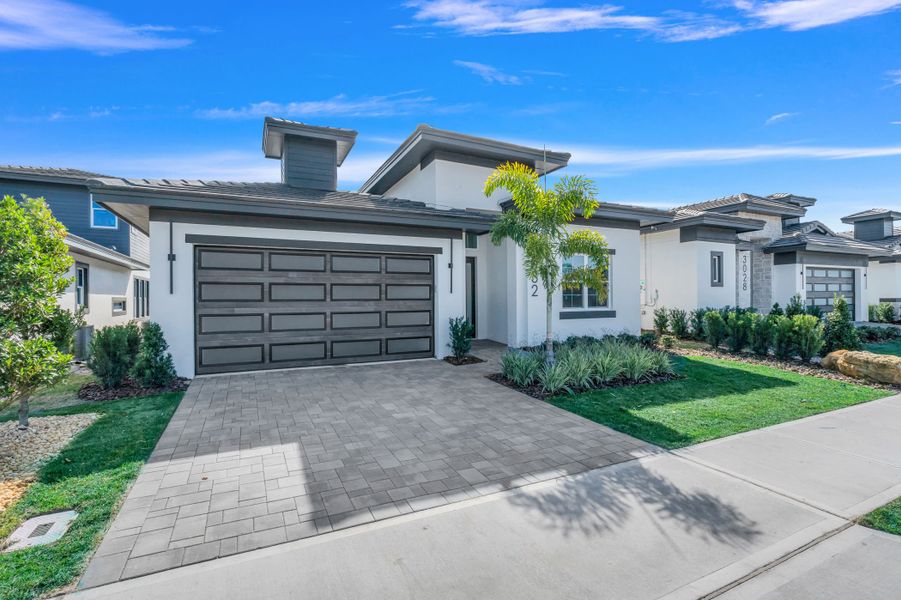 Representative exterior photo of a completed home built from the Marbella by ABD Development in Hampton Green at Providence, Davenport, FL (Image 33).