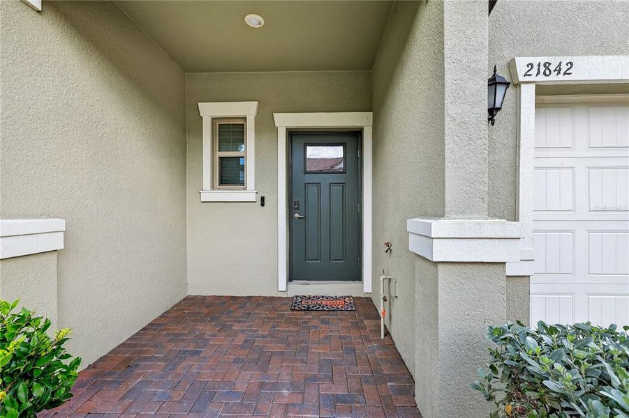 Front exterior of a new home in , Land O' Lakes, FL, highlighting curb appeal (Image 26).