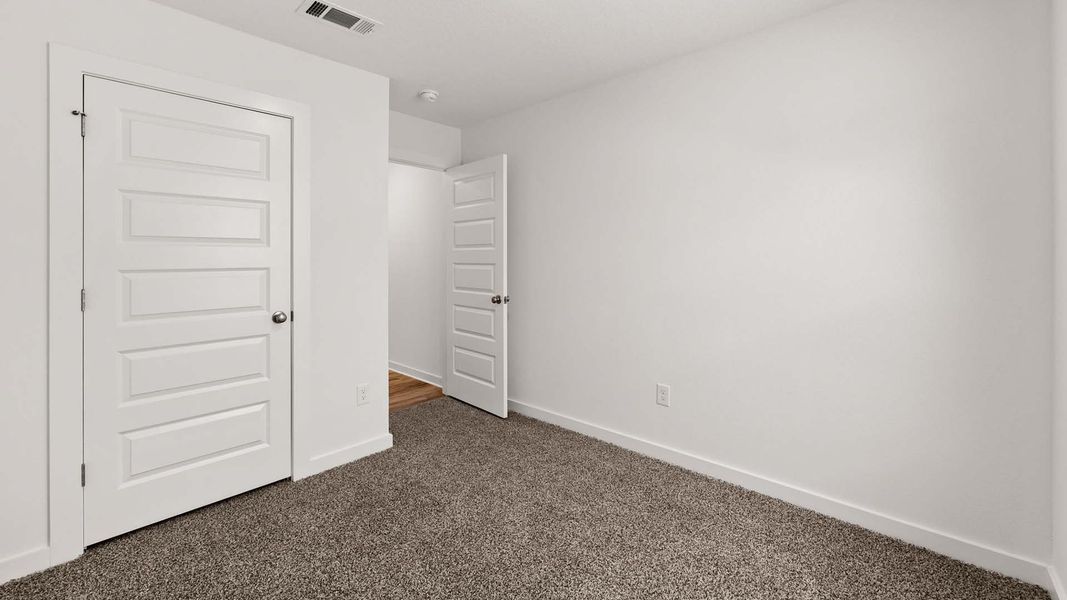 Spacious, unfurnished interior of a new home in Magnolia at the Bluffs Phase 3, Freeport (Image 24).