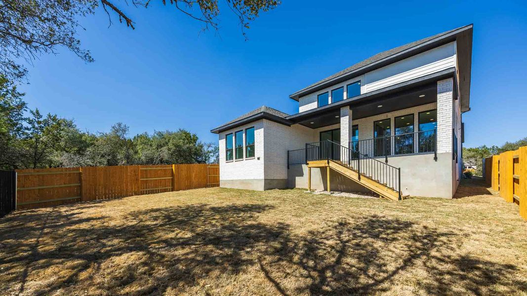 Exterior details and patio area of a home in Parkside On The River, Georgetown (Image 2).