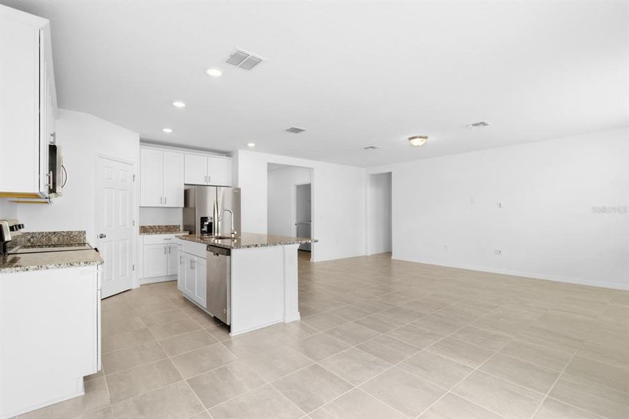 Furnished interior view inside a new home in Lawson Dunes - Signature Series, Haines City (Image 13).