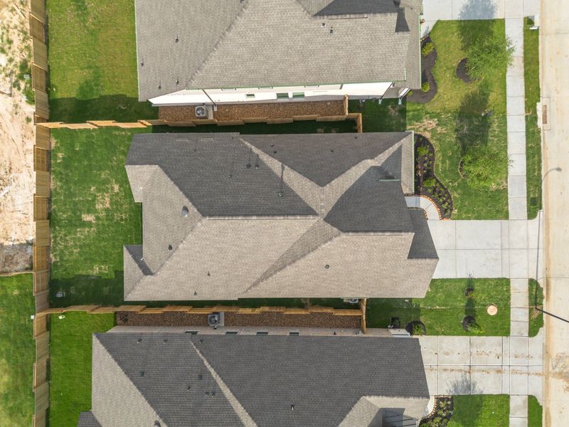 Representative exterior photo of a completed home built from the Summerton 50′ Lot by Chesmar Homes in Meridiana, Manvel, TX (Image 20). Representative exterior photo of a completed home built from the Summerton 50′ Lot by Chesmar Homes in Meridiana, Manvel, TX (Image 20).