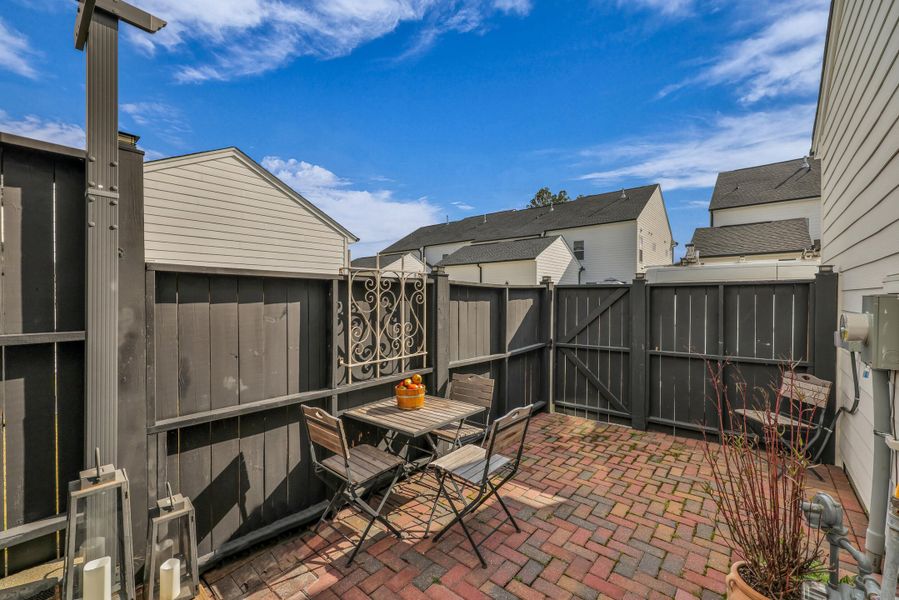 Exterior details and patio area of a home in Homecoming, Ravenel (Image 27). Exterior details and patio area of a home in Homecoming, Ravenel (Image 27).