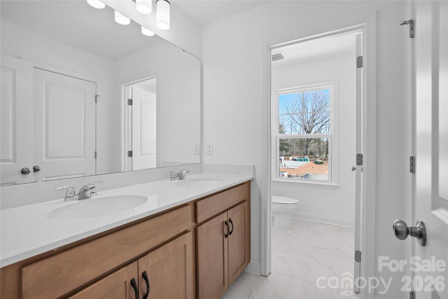 Furnished interior view inside a new home in Elmbrook, Indian Trail (Image 12).