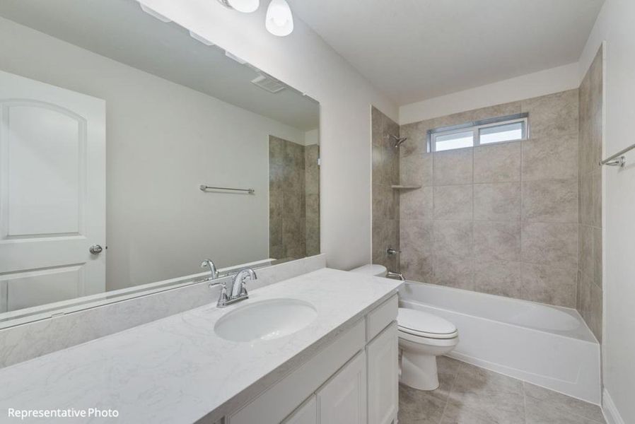 Representative furnished interior of a home built from the Hartford II by Grand Homes in Edgewater, Fate (Image 10).