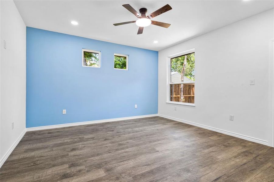 Accent wall with two well located windows for privacy and window facing backyard Accent wall with two well located windows for privacy and window facing backyard