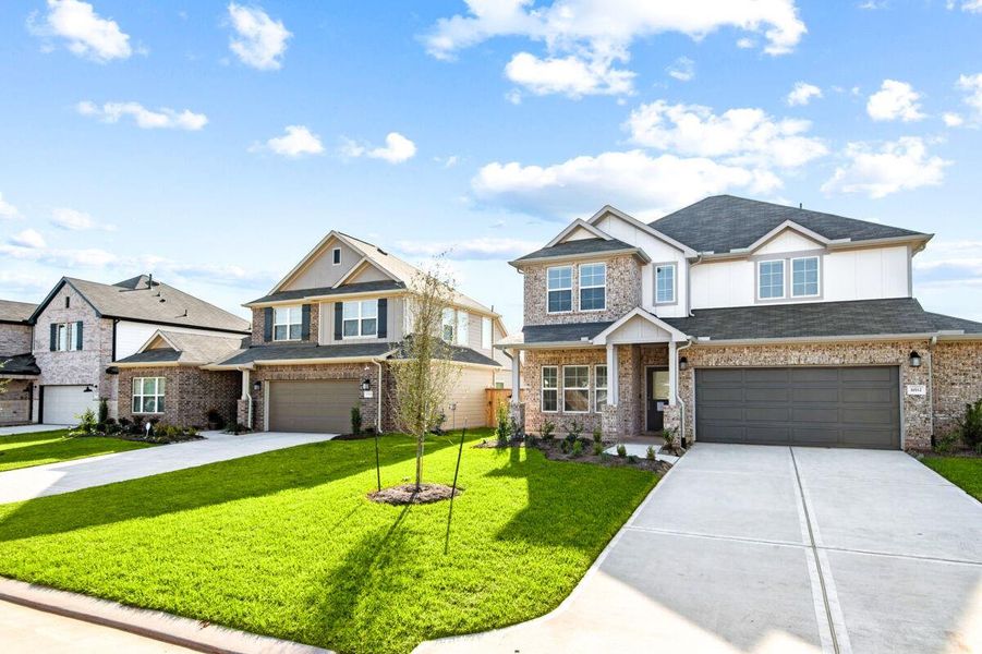 Front exterior of a new home in Lone Star Landing, Montgomery, TX, highlighting curb appeal (Image 17).