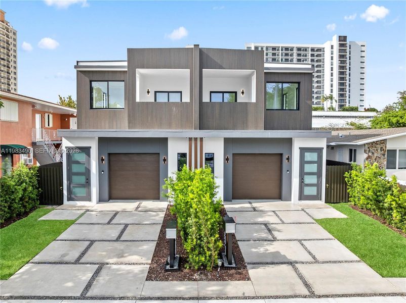 Front exterior of a new home in , Miami, FL, highlighting curb appeal (Image 2). Front exterior of a new home in , Miami, FL, highlighting curb appeal (Image 2).