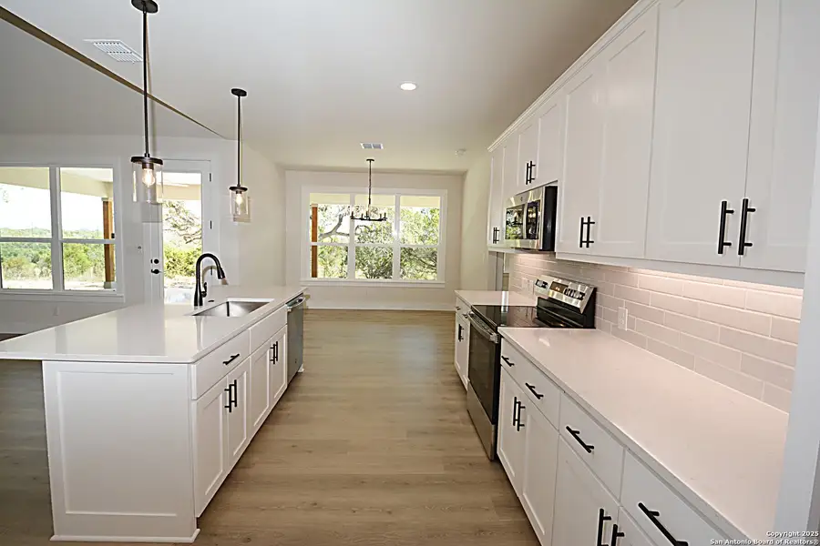 Furnished interior view inside a new home in , Fischer (Image 2). Furnished interior view inside a new home in , Fischer (Image 2).