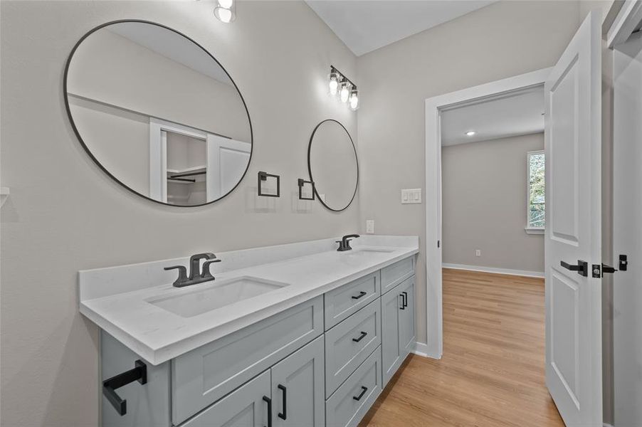 Primary bath has dual vanities as well.