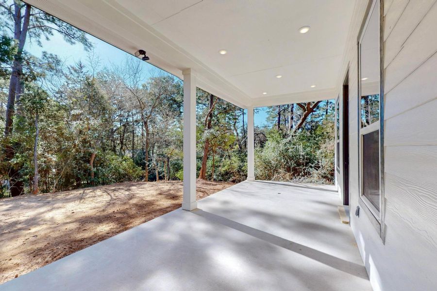 View of patio with view of scattered trees