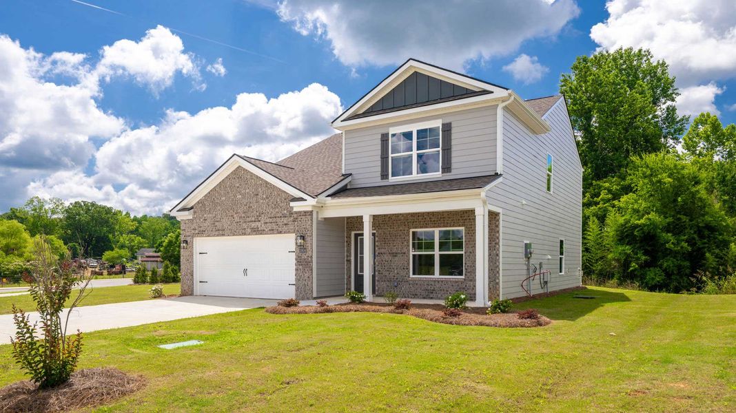 Front exterior of a new home in Prairie Pass, Apison, TN, highlighting curb appeal (Image 2).
