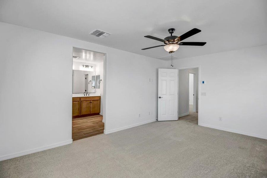 Spacious, unfurnished interior of a new home in Ironwood Villages at North Creek, Queen Creek (Image 15).
