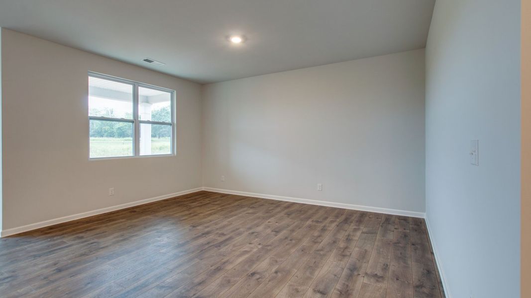 Spacious, unfurnished interior of a new home in The Parks, White House (Image 22).