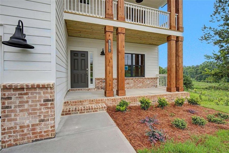 Exterior details and patio area of a home in The Reserve at Chapel Hill Phase II, Douglasville (Image 20).