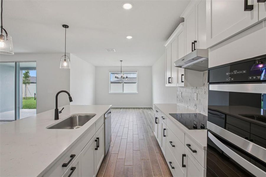 Furnished interior view inside a new home in Two Rivers - Signature Series, Zephyrhills (Image 9).