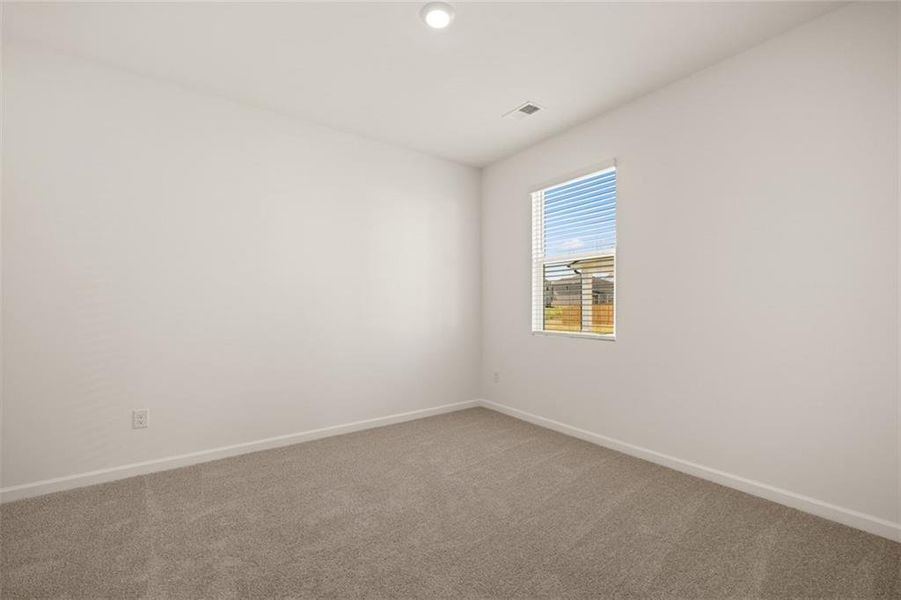 Spacious, unfurnished interior of a new home in Preserve at Dove Creek, Statham (Image 35).
