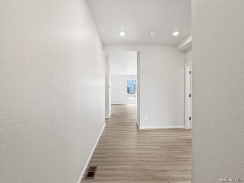 Spacious, unfurnished interior of a new home in Buffalo Highlands: The Flora Collection, Commerce City (Image 25).