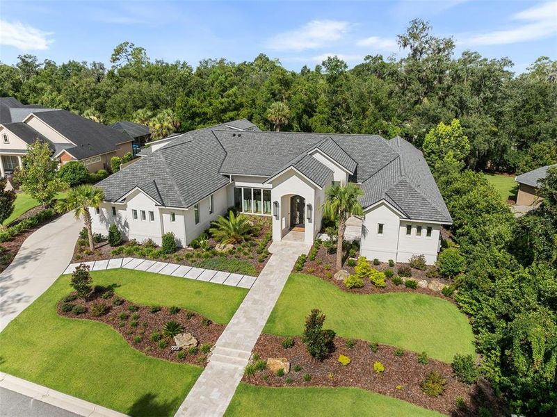 Front exterior of a new home in , Gainesville, FL, highlighting curb appeal (Image 2).