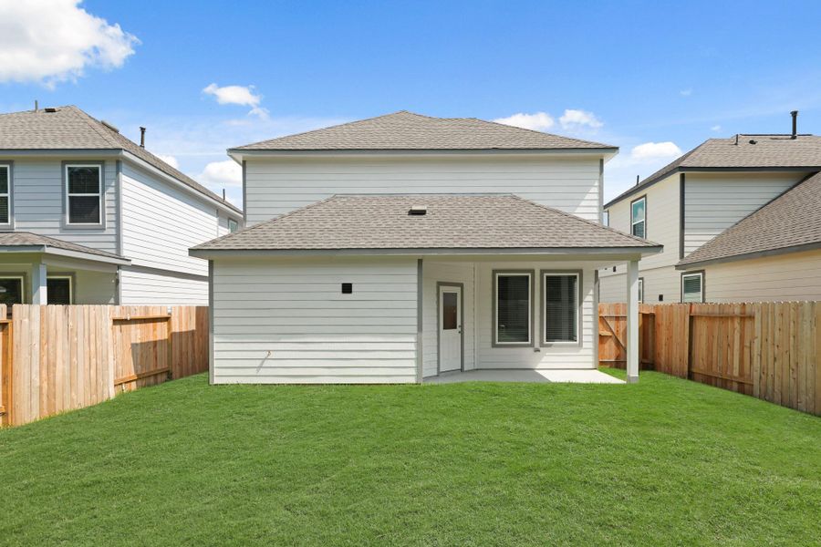 Exterior details and patio area of a home in Cypresswood Landing, Humble (Image 18).