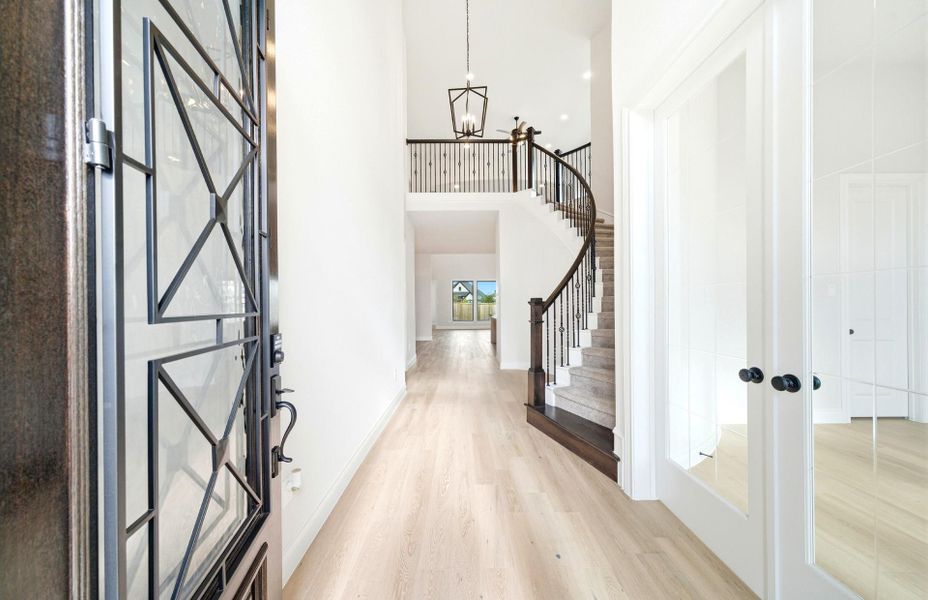 Furnished interior view inside a new home in Bridgeland 50', Cypress (Image 8).