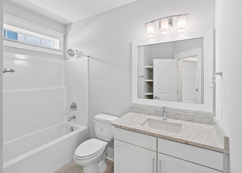 Representative furnished interior of a home built from the Birchwood by Bill Clark Homes in Osprey Landing, Southport (Image 8).