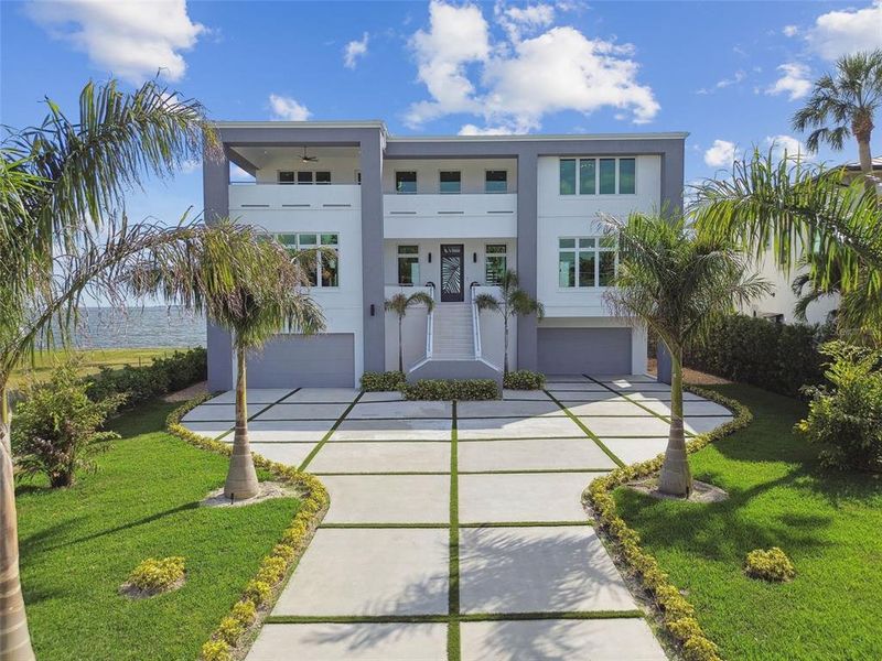 Front exterior of a new home in , Tampa, FL, highlighting curb appeal (Image 1). Front exterior of a new home in , Tampa, FL, highlighting curb appeal (Image 1).
