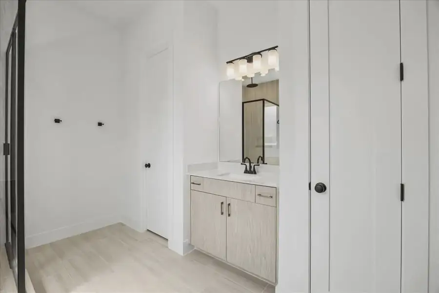 Representative furnished interior of a home built from the Courtney by Chesmar Homes in 6 Creeks, Kyle (Image 6).