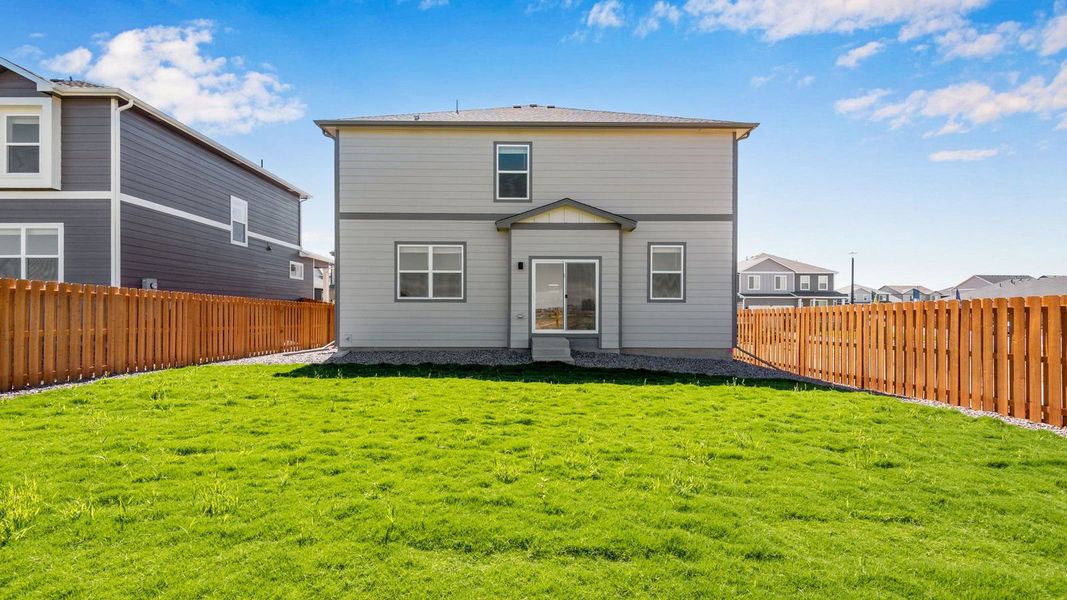 Exterior details and patio area of a home in Vista Meadows, Fort Lupton (Image 17).