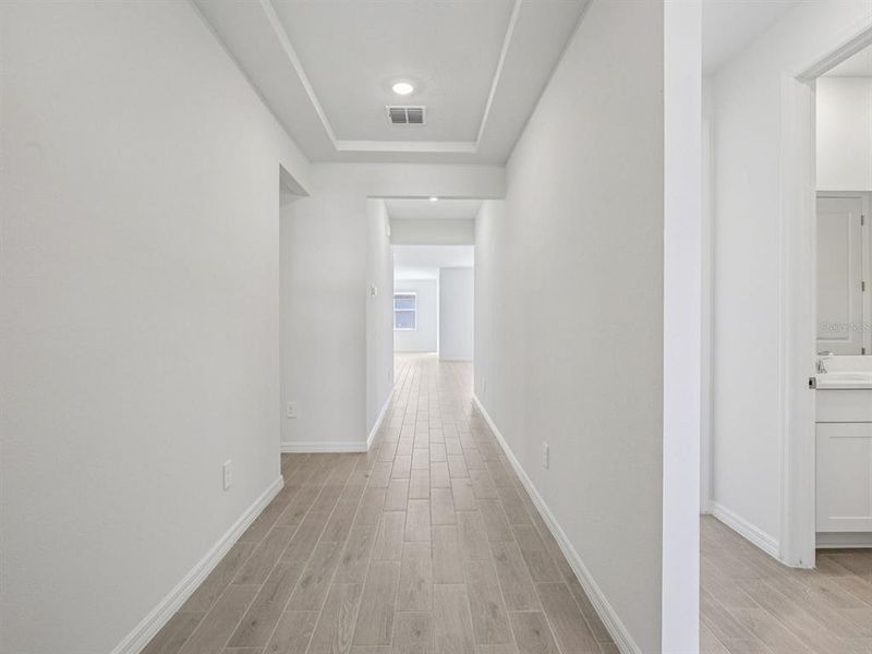 Spacious, unfurnished interior of a new home in Coasterra - Reserve Series, Palmetto (Image 25).