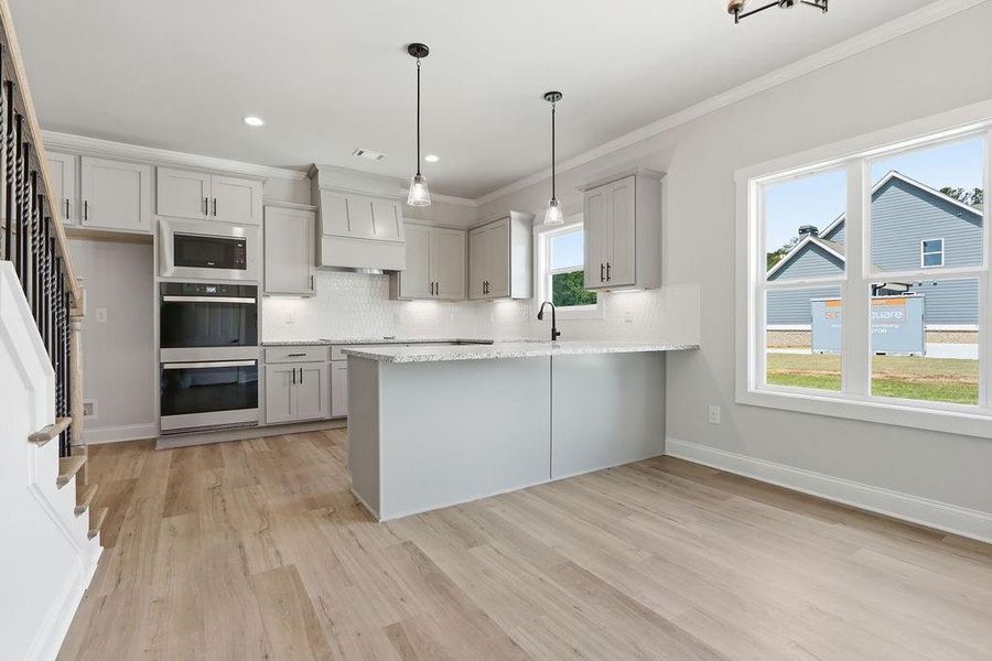 Furnished interior view inside a new home in , Monroe (Image 5).