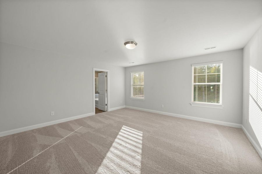 Spacious, unfurnished interior of a new home in Cottages at Piper Village, Trinity (Image 35).