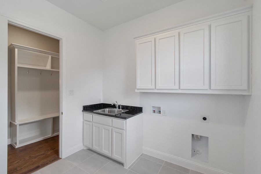 Laundry Room | Concept 3634 at Hidden Creek Estates in Van Alstyne, TX by Landsea Homes