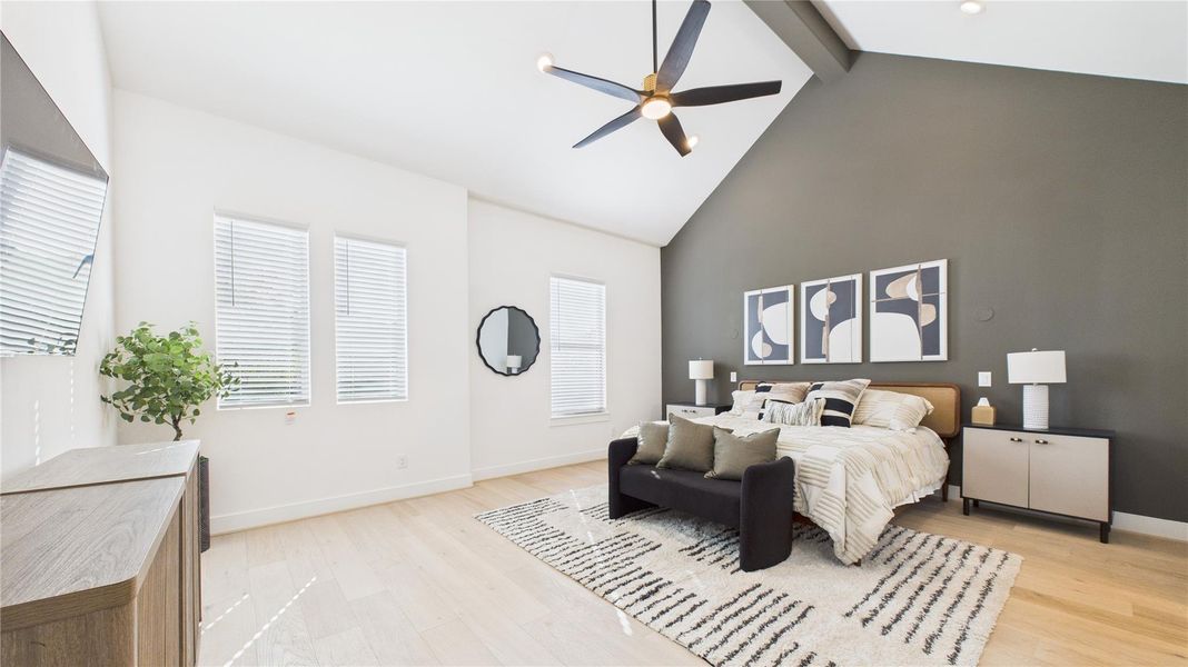 Primary Bedroom **Photo of model home with upgrade: accent wall**