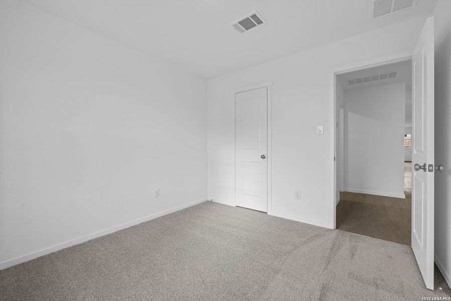Spacious, unfurnished interior of a new home in Voss Farms, New Braunfels (Image 15).