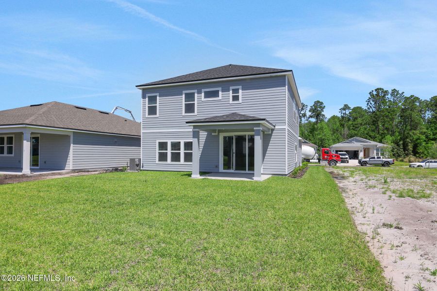 Exterior details and patio area of a home in Hyland Trail, Green Cove Springs (Image 24).
