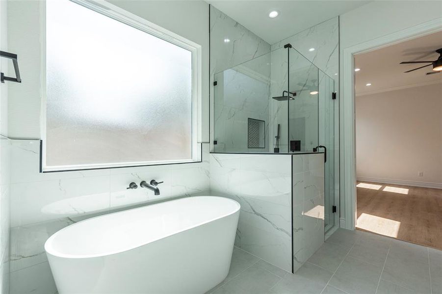 Large soaking tub and frosted window