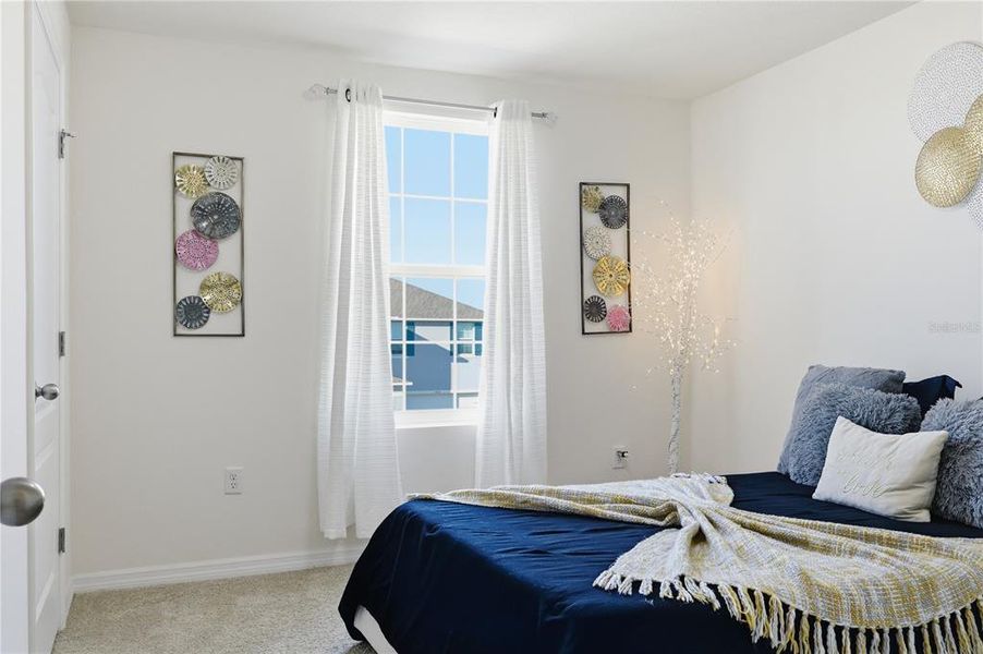 Furnished interior view inside a new home in Wind Meadows South, Bartow (Image 11).