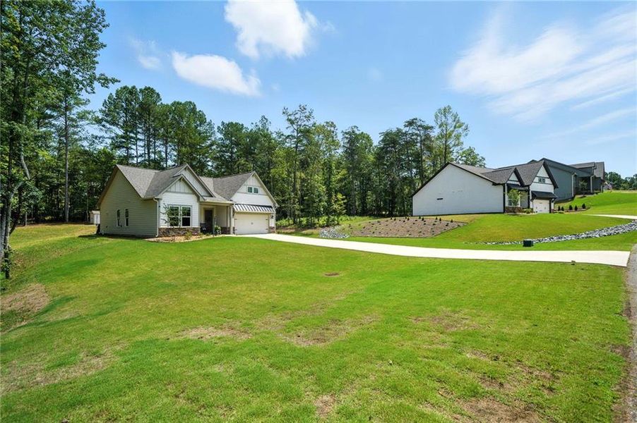 Front exterior of a new home in , Ellijay, GA, highlighting curb appeal (Image 24).