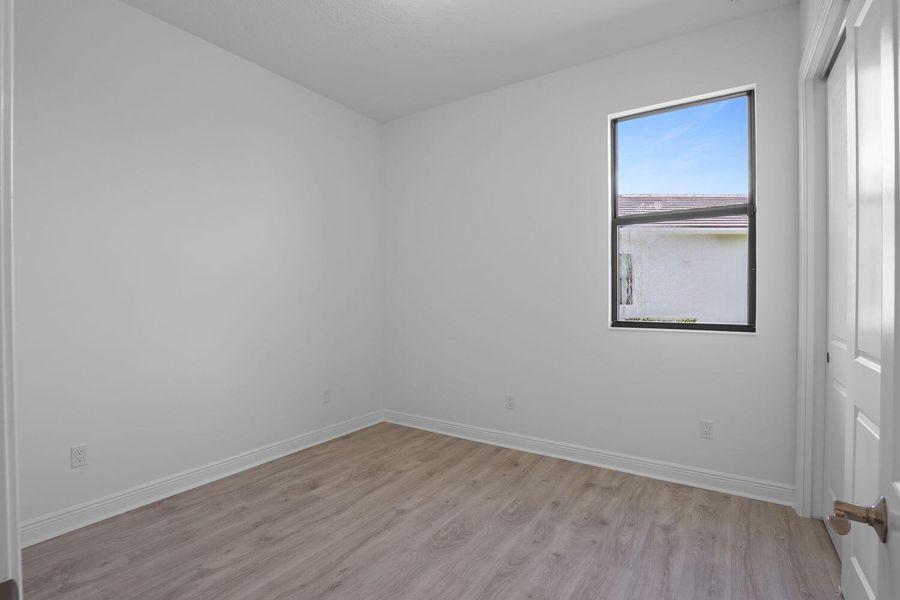 Furnished interior view inside a new home in Cresswind Palm Beach at Westlake, Westlake (Image 17).