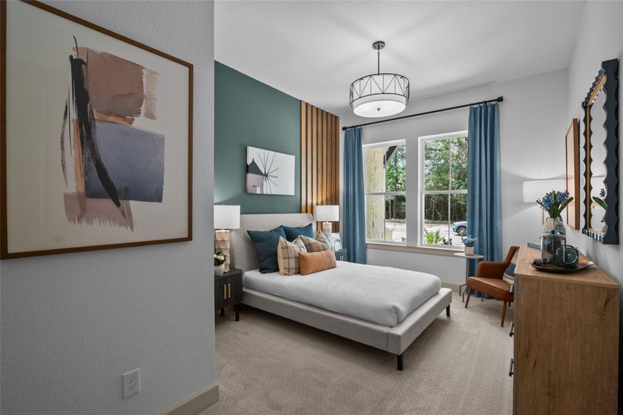 REPRESENTATIVE PHOTO:  This guest bedroom offers an ensuite bath with walk-in shower