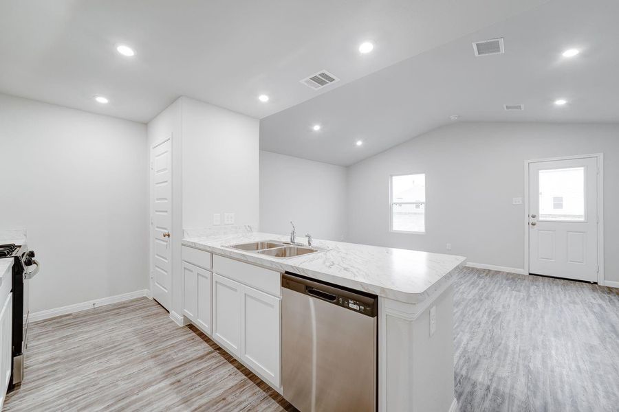 Furnished interior view inside a new home in Pirate's Cove Estates, Vidor (Image 4).