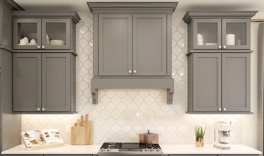 Glass upper cabinets and hexagonal backsplash