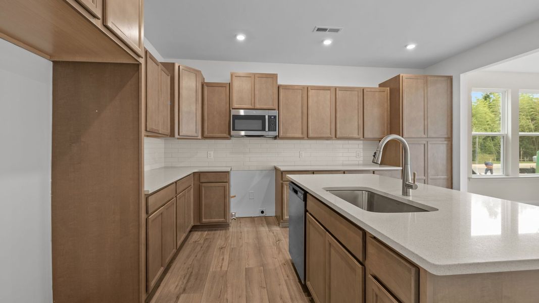 Furnished interior view inside a new home in Leigh Park, Charlotte (Image 4).