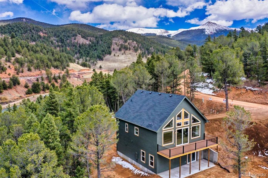 Front exterior of a new home in , Divide, CO, highlighting curb appeal (Image 21). Front exterior of a new home in , Divide, CO, highlighting curb appeal (Image 21).