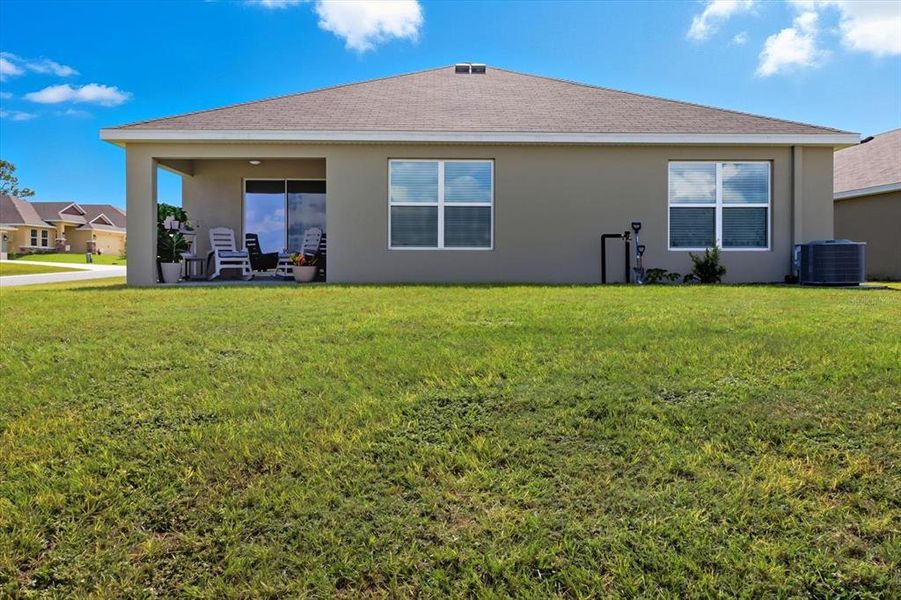 Front exterior of a new home in Fairways at Twisted Oaks, Beverly Hills, FL, highlighting curb appeal (Image 18).