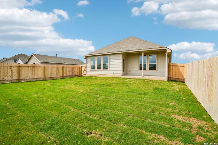 Exterior details and patio area of a home in Prairie Green, Converse (Image 3).