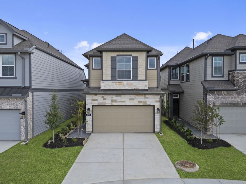 Front exterior of a new home in Bridgeland, Cypress, TX, highlighting curb appeal (Image 20).