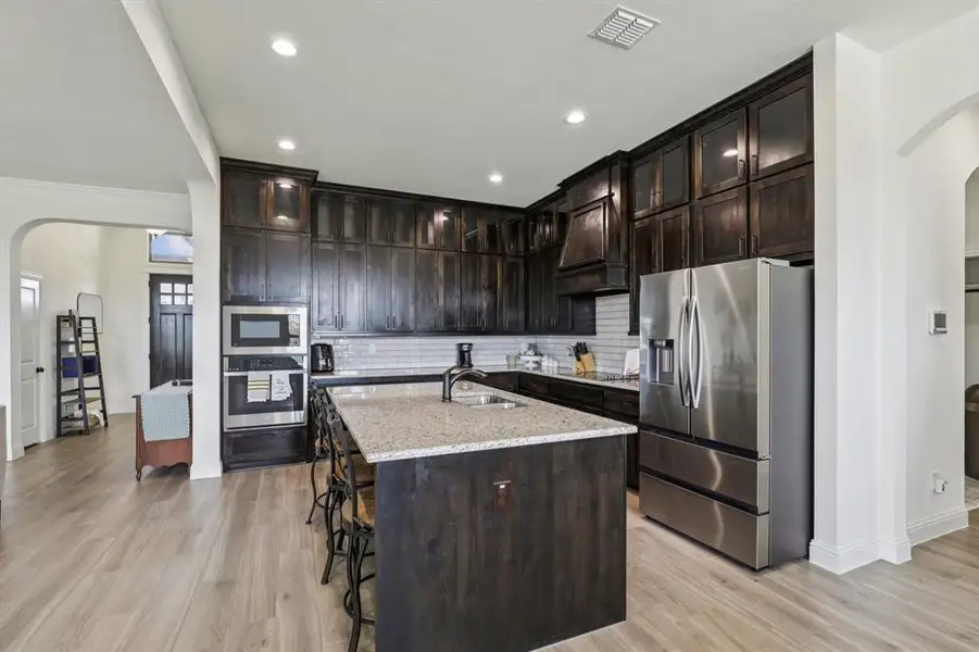 Furnished interior view inside a new home in , Waxahachie (Image 32).
