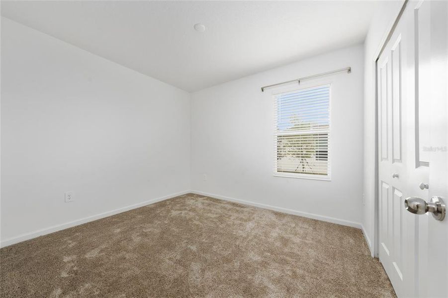 Spacious, unfurnished interior of a new home in Lawson Dunes, Haines City (Image 24).
